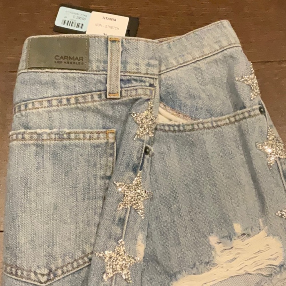Jean shorts with stars on sides. Brand is Carmar. Purchased from LF.